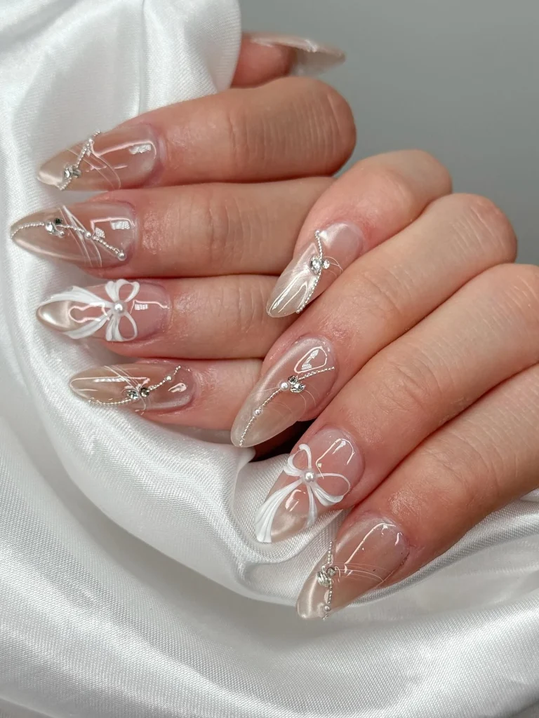 Delicate Bow Nails with Soft Shine