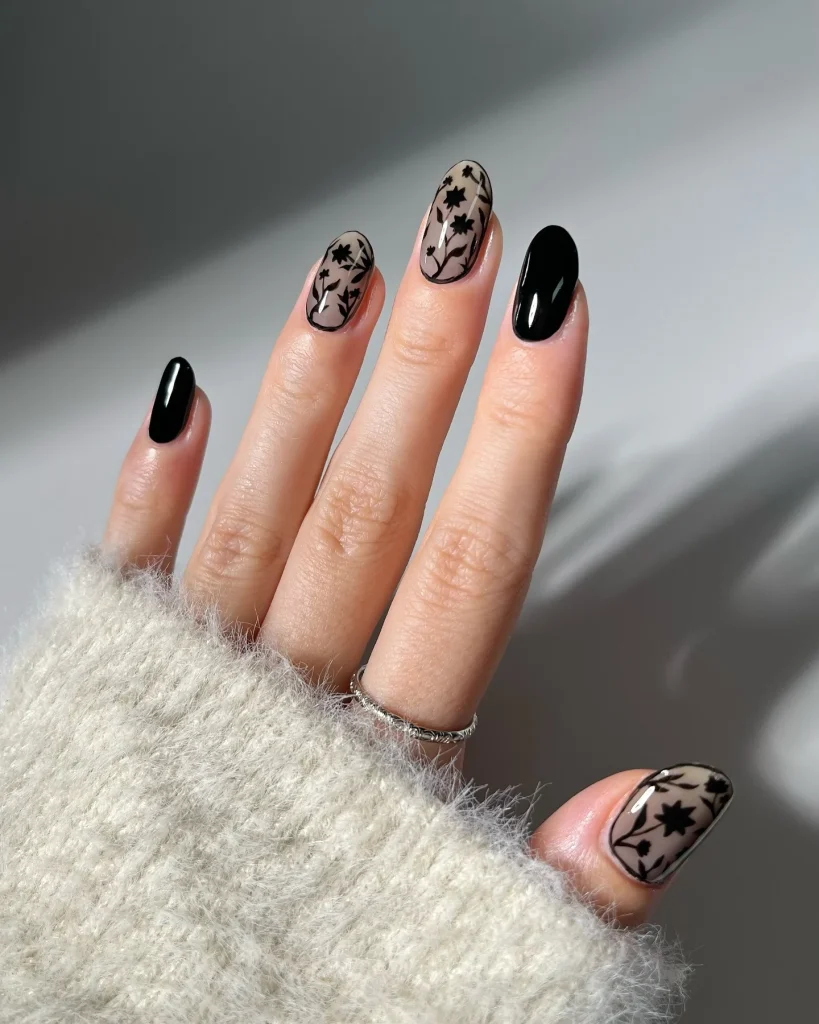 Bold Black Nails with Sheer Floral Art