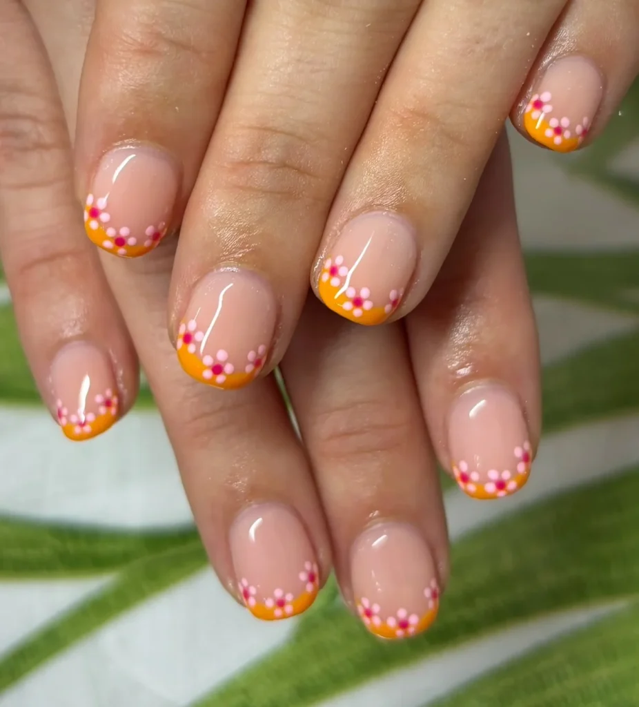 Sunny Orange Daisy French Tips That Feel Playfully Fresh