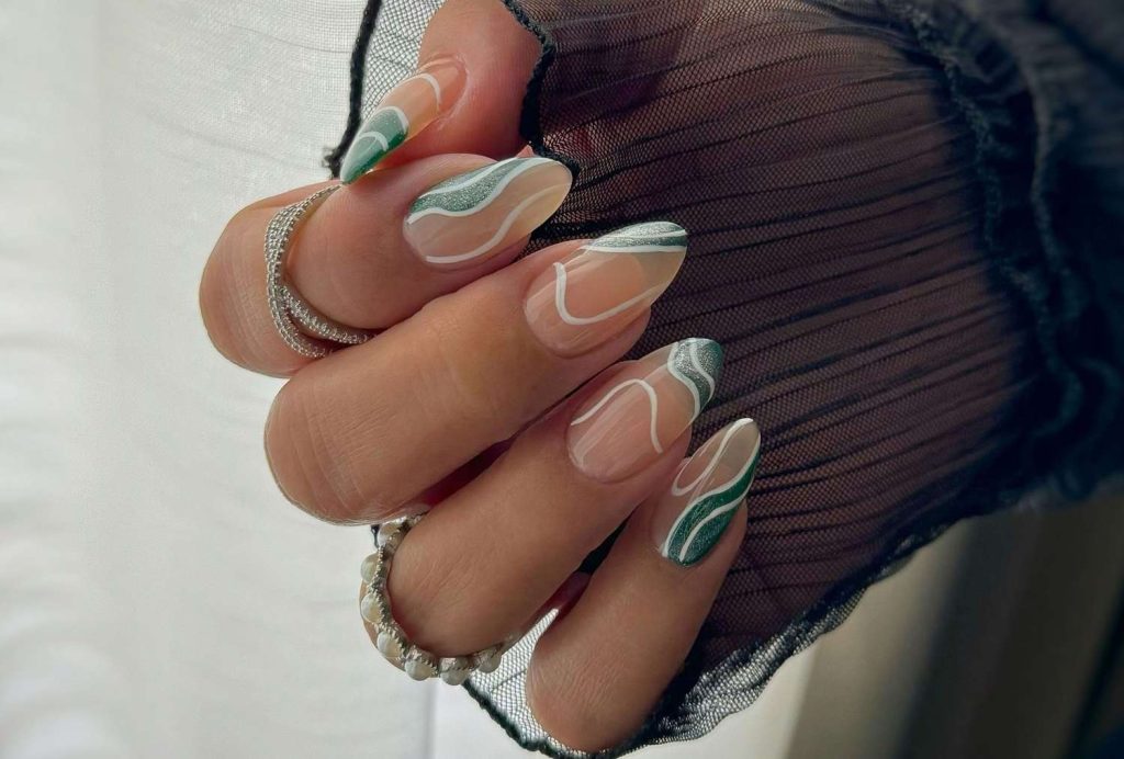 Elegant Green Swirl Almond Nails That Scream Spring Chic