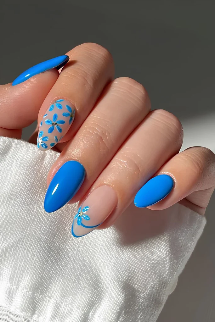 Bright Blue Floral Almond Nails That Feel Fresh & Eye-Catching