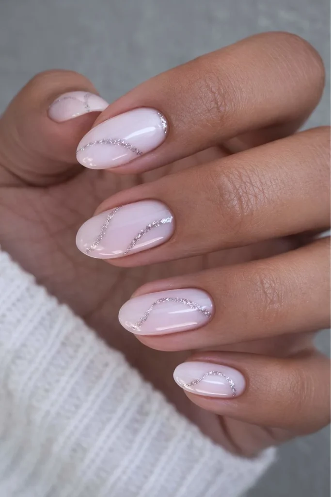 Milky Swirl Nails with Silver Shine That Feel Soft and Chic