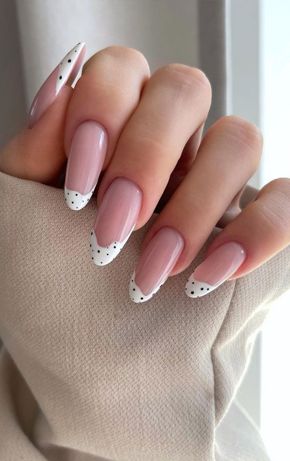 Chic Polka Dot French Almond Nails That Feel Clean
